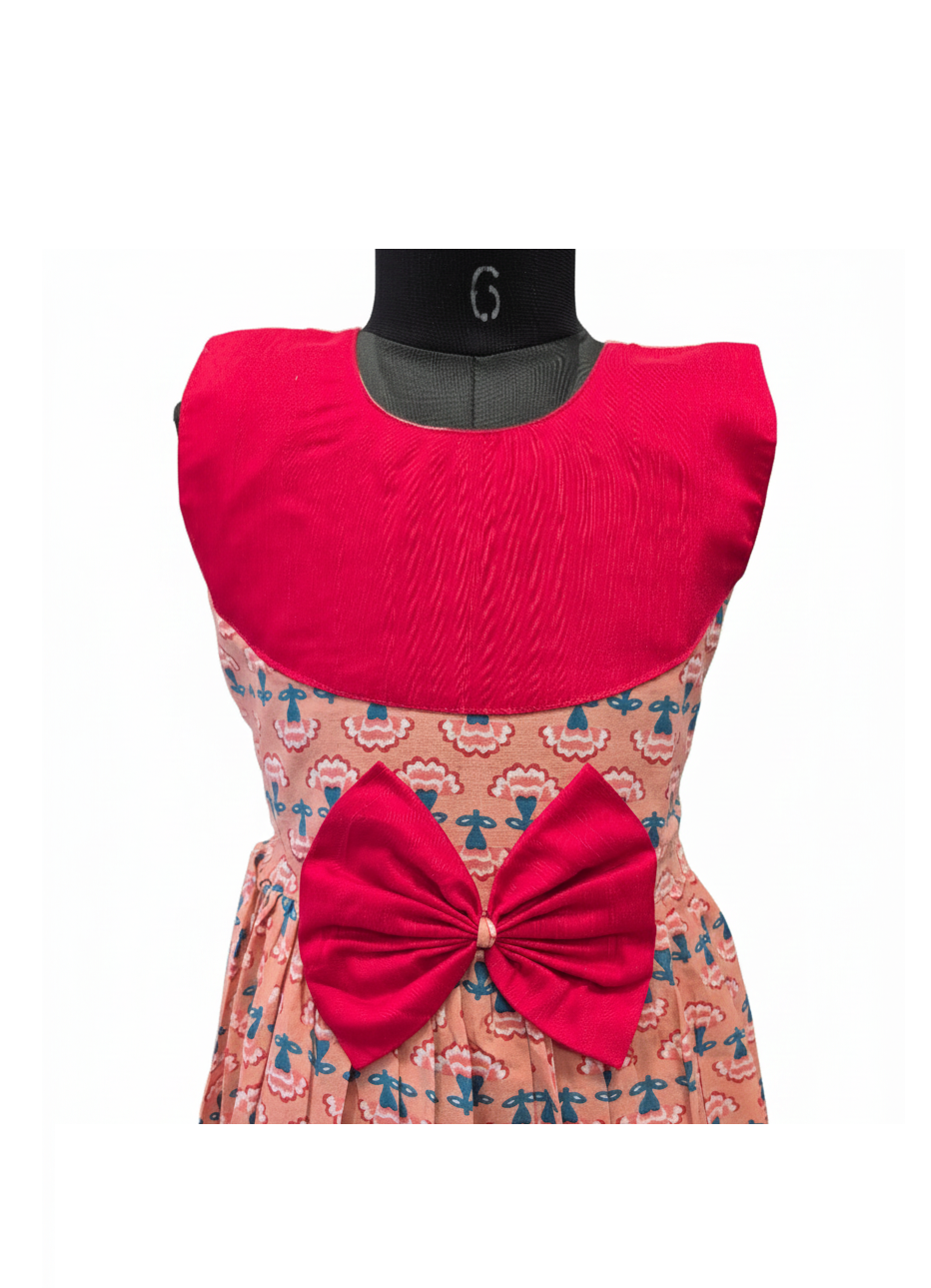 Sweetheart Style Peach Cotton Frock with Big Red Bow and Pleated Hem