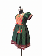 Dark green traditional Khun knee length frock with peach embroidered silk yoke - House of Kritee