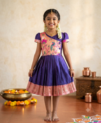 Traditional purple and peach paithani silk knee length frock for girls with peacock motif - House of Kritee