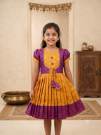 Silk knee length frock for girls with zari border, mustard and purple pattu pavadai dress for kids - House of Kritee