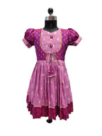 Traditional magenta and lilac silk knee length frock for girls with tassels - House of Kritee