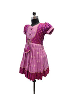 Traditional magenta and lilac silk knee length frock for girls with tassels - House of Kritee