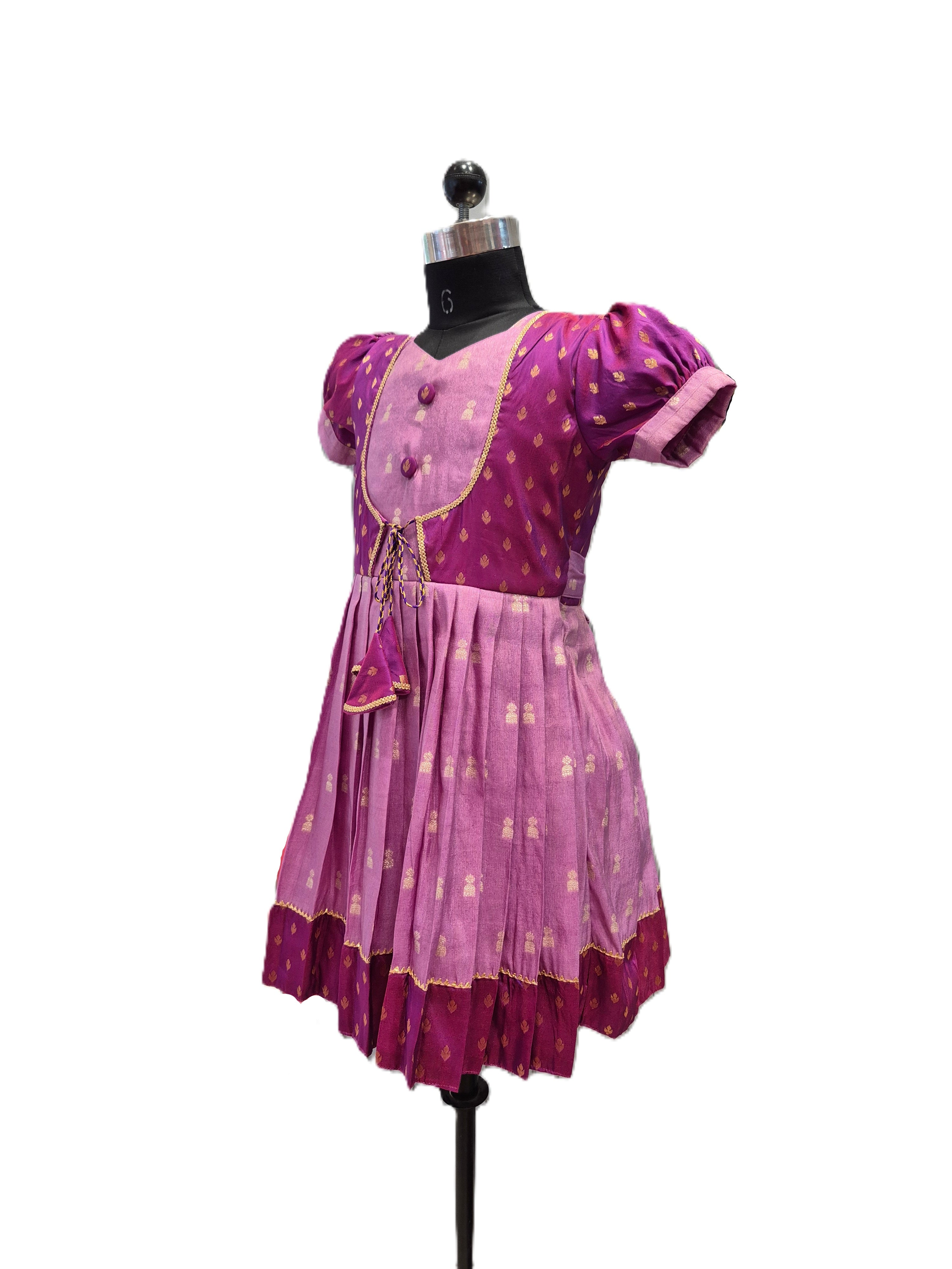 Traditional magenta and lilac silk knee length frock for girls with tassels - House of Kritee