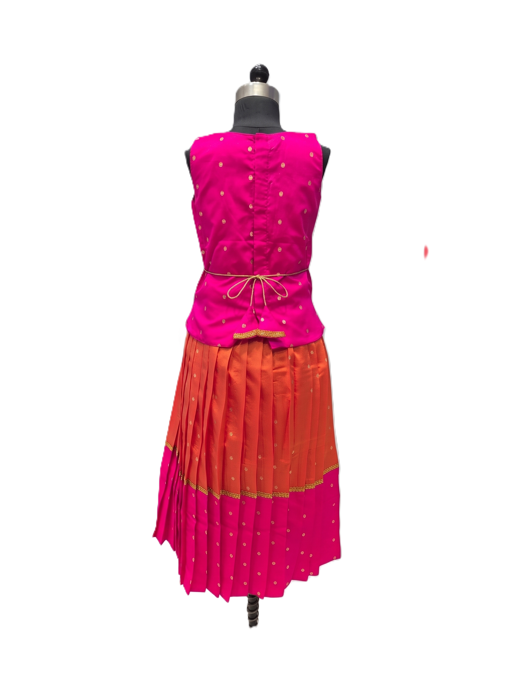 A sleeveless traditional outfit displayed on a mannequin against a plain white background. The set features a bright pink sleeveless top with small gold motifs and a matching pleated skirt in orange and pink with gold detailing. - House of Kritee