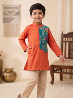 Boys traditional orange silk kurta pyjama set with teal brocade panel - House of Kritee