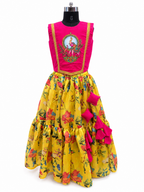 A sleeveless traditional-style dress displayed on a black dress form against a white background. The bodice is bright pink with gold trim and a central embroidered motif featuring a horse and rider. - House of Kritee