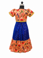 Happy Desi girl model wearing a royal blue silk one piece dress with peach floral jacket set - House of Kritee