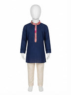 Boy wearing royal blue printed kurta pajama ethnic set 