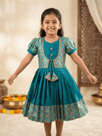 Little girl wearing teal ethnic silk frock with traditional floral jacket"