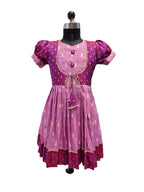 Traditional magenta and lilac silk knee length frock for girls with tassels - House of Kritee