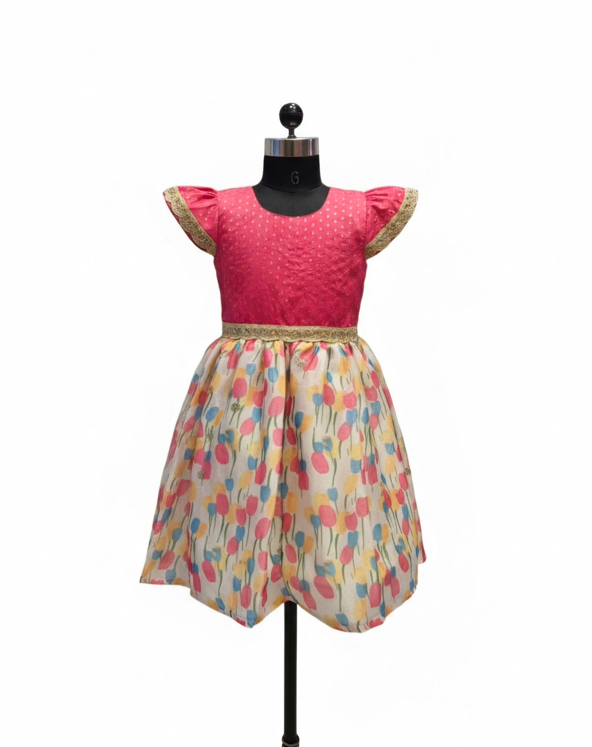 Young Indian girl model wearing pink silk and multi color floral print knee length festive dress - House of Kritee