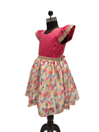 Young Indian girl model wearing pink silk and multi color floral print knee length festive dress - House of Kritee