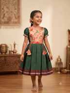 Dark green traditional Khun knee length frock with peach embroidered silk yoke - House of Kritee