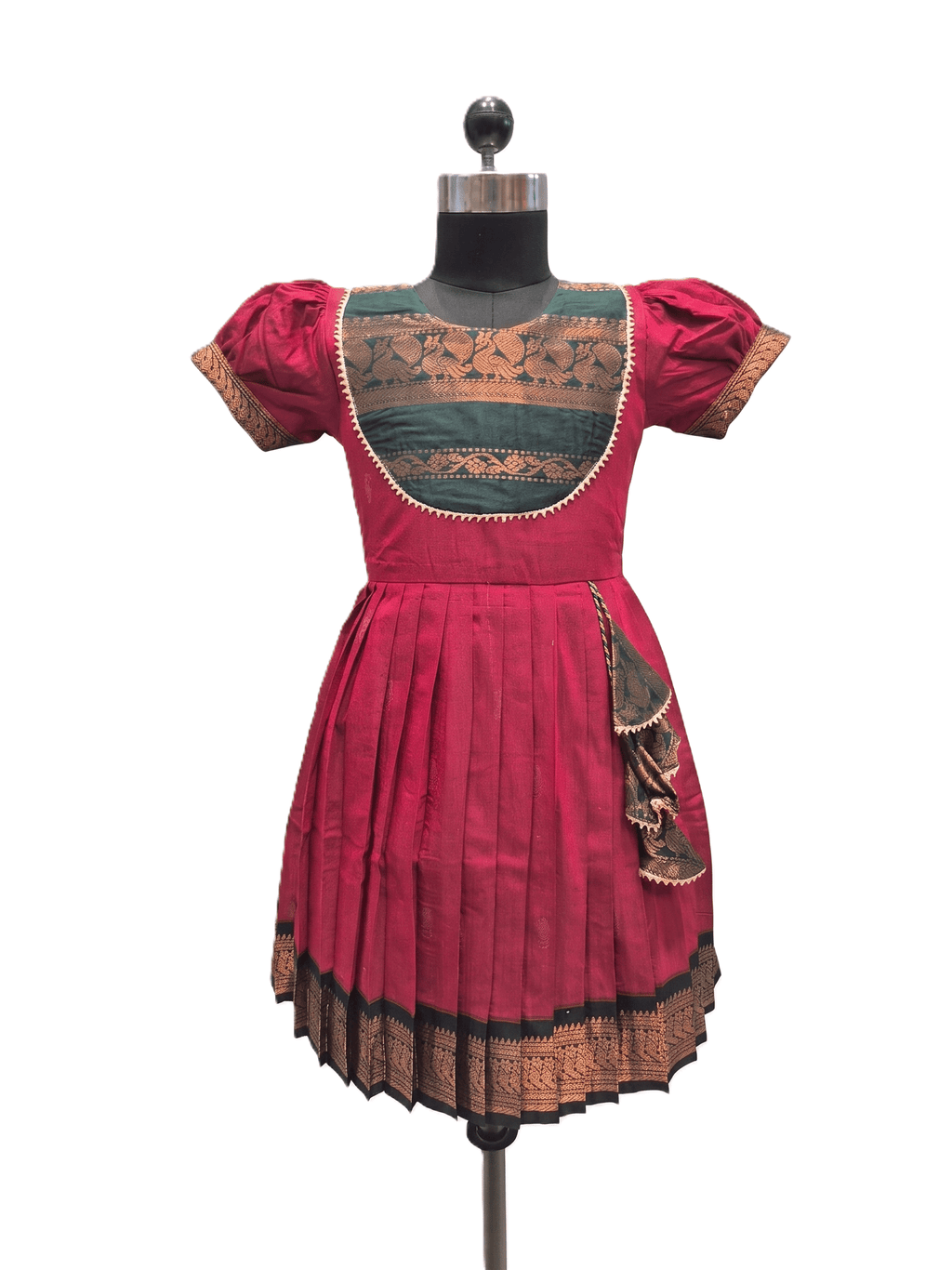 A traditional Indian salwar suit dress displayed on a black mannequin. The dress features a vibrant magenta-pink skirt and sleeves, a contrasting teal green embroidered yoke, and intricate gold zari embroidery throughout. - House of Kritee